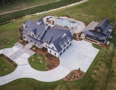 an aerial view of a large home in the country