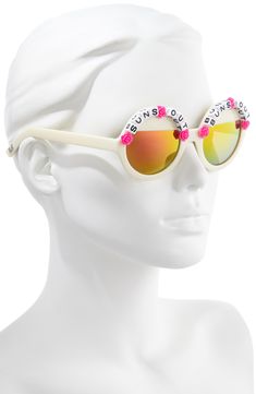 Make a playful statement with these retro-chic round sunglasses accented with flowers and beads. 100% UV protection Polycarbonate lenses Plastic Made in the USA Retro Round Sunglasses For Beach, Retro Round Sunglasses For The Beach, Trendy Round Sunglasses For Spring, Orange Sunglasses With Mirrored Lenses For Spring, Orange Mirrored Sunglasses For Spring, White Fun Sunglasses For Spring, Spring Orange Sunglasses With Mirrored Lenses, Fun White Sunglasses For Spring, Orange Sunglasses For Spring Vacation