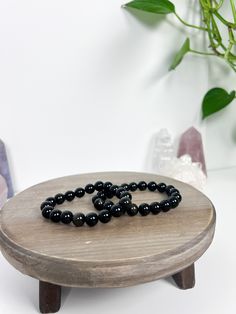 To stay updated on new items follow us on Instagram @magnoliamooncrystalco or follow this link! http://www.instagram.com/magnoliamooncrystalco Gold sheen Obsidian bracelet with 10mm beads. Bracelet is 7.5" on an elastic band.  Chakra: Root, Solar Plexus Element: Wind Gold Sheen Obsidian is an excellent tool for gazing, viewing the future, or accessing knowledge from the past. It dissolves negativity and purifies the aura, and is particularly useful for clearing blockages. It's also particularly Obsidian Gemstone Beads Crystal Bracelet, Onyx Crystal Bracelet With 8mm Round Beads, Gold Sheen Obsidian, Hidden Talents, Chakra Root, Obsidian Bracelet, Sheen Obsidian, Moon Crystal, Solar Plexus