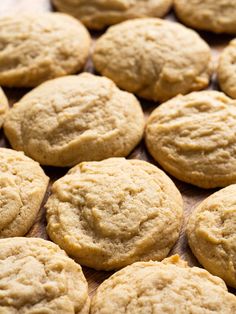 a close up view of some cookies on a table with other cookies in the background