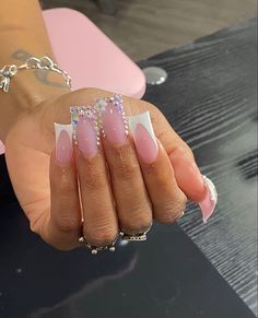 There's a new beauty trend taking over Instagram and it's absolutely stunning. Say hello to "quartz nails". French Tip Acrylic Nails Birthday, Bling French Tip, Pink French With Diamonds, Rhinestone French Tip, French Tip Nails With Diamonds, Light Pink French Tip Nails With Gems, Pink French Tip Nails Square With Gems, French Tip Bling Nails, Square Shape Nails