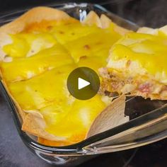 a casserole dish with cheese and meat in it