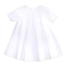 Beautiful white smocked bishop dress with short puff sleeves has detailed smocking around the neckline. Beautiful dress for Christening Baptism or Dedication. Darling baby girls day dress for coming home outfit, first portraits or any special occasion. 65% Polyester 35% Cotton Comes with a matching white bonnet with ruffle trim Elegant Smocked Dress With Smocked Cuffs For Baptism, Elegant Smocked Ruffle Dress For Baptism, White Puff Sleeve Dress For First Communion, Elegant Smocked Dresses For Baptism, Elegant Smock Dresses For Baptism, Elegant White Smocked Dress For Baptism, White Fitted Smocked Dress For Baptism, Fitted Short Sleeve Smocked Dress With Lace Trim, Classic White Smocked Dress