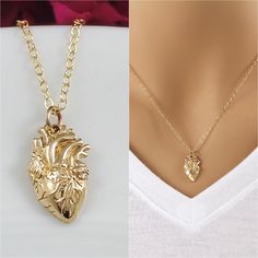 "Anatomical Heart Necklace.  This beautiful anatomical heart necklace features an Italian bronze anatomical heart charm on a 14k gold filled flat cable chain.  The highly detailed heart charm features lifelike heart details, from the four chambers to all the arteries and veins.   The flat cable chain is very pretty, as it catches the light and gives the chain the little shimmer. The high quality anatomical heart charm measures .79 x .39\" (20mmx10mm). Charm is not 3D, but is flat on the back, so Human Heart Necklace, Realistic Heart, Anatomical Heart Necklace, Arteries And Veins, Anatomical Heart, Dope Jewelry, Handmade Wire Jewelry, Jewelry Lookbook, Lake Superior