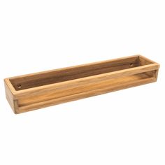 a wooden tray with two compartments on the bottom and one in the middle, against a white background