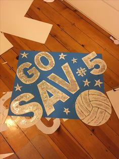 a blue and gold sign that says go save 5 with some stars on top of it