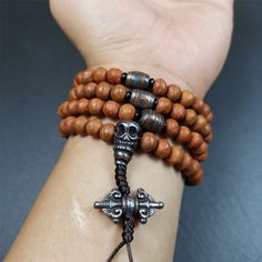 ❤This bodhi beads mala is made by Tibetan craftsmen and come from Hepo Town, Baiyu County, the birthplace of the famous Tibetan handicrafts,about 30 years old, hold and blessed by a lama in Baiyu Monastery.It is composed of 108 bodhi seed beads, and is equipped with 3 cold iron dzi beads, cold iron bead counters are installed on both sides, 1 mani jewel bead clip,and finally consists a skull guru bead and vajra on the end, very elegant.❤Details1. Handmade 108 bodhi beads approximately 8-9mm,mala Beads Mala, Iron Beads, A Skull, 30 Years Old, Mala Beads, Prayer Beads, 30 Years, Seed Beads, Beaded Necklace