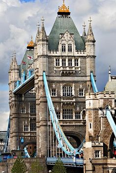 the tower bridge is very tall and has many windows