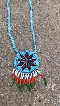 The Nations Navajo Blue Beaded Tribe Necklace Southwestern Blue Beaded Necklaces For Gift, Handmade Southwestern Blue Beaded Necklace, Native American Seed Bead Necklace, Beaded Rope Necklace Native, Southwestern Style Hand-strung Blue Beaded Necklaces, Native American Patterns, Vintage Ashtray, Vintage Wool, Vintage Jeans