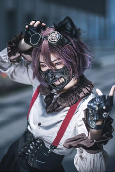 young woman with purple hair wearing a steampunk cosplay ensemble and a steampunk mask Dieselpunk Soldier, Black Hair Colors, Hair Colors Red, Steampunk Face Mask, Steam Punk World, Steampunk Face, Cheshire Cat Cosplay, Steampunk Hair, Brown Black Hair