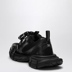 Black mesh and polyurethane low top trainer from Balenciaga featuring a lace-up fastening, a round toe, a logo on the edge at the toe and back, an embossed size on the upper and behind the heel, a back loop and tongue with reflective detailing and a rubber sole. Size Type: ITMaterial: PolyesterSKU: 734731W3XL1/P_BALEN-1010_500 Our Products Are 100% Genuine. In All Cases We Stand By The Authenticity Of Every Product Sold On Our Site. Cristobal Balenciaga, Espadrilles Slides, Spanish Fashion, Un Logo, Pumps Flat, Crossbody Tote, On The Edge, Boot Sandals, Black Mesh