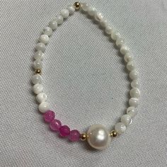 Freshwater Pearl & Pink Agate Elastic Bracelet Center Freshwater Pearl Sides Mother Of Pearl Brand New This Bracelet Is Made Of Gold Plated Sterling Silver Beads Freshwater Pearls And Pin Elegant White Beaded Bracelets With Gemstones, Elegant White Beaded Gemstone Bracelets, Elegant White Gemstone Beaded Bracelets, White Crystal Bracelet For Everyday Use, White Crystal Bracelet For Everyday, Everyday White Crystal Bracelet, White Beaded Gemstone Bracelets For Everyday, White Pearl Bracelets With Gemstones, White Pearl Gemstone Bracelets