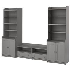 a gray bookcase with drawers and shelves