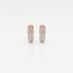 The Bombë Micro Huggie is a luxurious take on an everyday favorite. A miniature version of a classic hoop earring, these 14K gold diamond huggie earrings exude elegance and contemporary style. Three rows of lab grown pave diamonds embellish the curved shape of the earrings, encouraging you to dazzle from every angle. Luxury Rose Gold Hoop Earrings With Single Cut Diamonds, Luxury Rose Gold Huggie Earrings With Brilliant Cut, Luxury Rose Gold Brilliant Cut Huggie Earrings, Luxury Rose Gold Huggie Earrings For Formal Occasions, Formal Rose Gold Huggie Earrings With Diamond Accents, Classic Rose Gold Huggie Earrings With Single Cut Diamonds, Rose Gold Pave Set Huggie Hoop Earrings, Rose Gold Huggie Hoop Earrings With Pave Setting, Rose Gold Huggie Earrings With Brilliant Cut