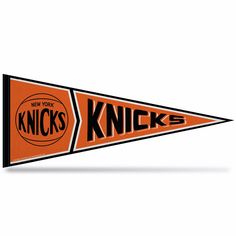 an orange and black pennant with the words knicks on it