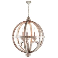 a wooden orb chandelier hanging from the ceiling with two candles in it and one light on top