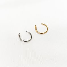 Add a little shine in an unexpected place with our handmade hoop nose rings/ earrings. No piercing needed for this nose cuff/ ear cuff. So comfortable you forget it's even there! ✔ Does Not Tarnish ✔ Hypoallergenic ✔ Water Resistant ✔ Quality Guaranteed ✔ Handmade SIZE: adjustable NOTE: this is a fake nose ring/earring, there is no piercing required. Adjustable Small Hoop Single Ear Cuff, Adjustable Round Ear Cuff For Everyday Wear, Adjustable Minimalist Small Hoop Ear Cuff, Minimalist Adjustable Small Hoop Ear Cuff, Adjustable Minimalist Round Ear Cuff, Minimalist Adjustable Round Ear Cuff, Hoop Nose Rings, Lip Cuffs, Earrings No Piercing