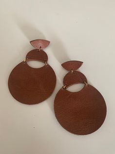 Handmade leather earrings with gold toned findings. Note that the triangle can be removed from the earring so that you can wear the gold piece alone. Chic Brown Earrings For Everyday Wear, Chic Brown Everyday Earrings, Chic Everyday Brown Earrings, Minimalist Brown Leather Earrings, Modern Brown Leather Earrings, Brown Leather Minimalist Earrings, Chic Brown Drop Earrings, The Triangle, Gold Piece