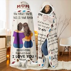 two women wrapped in blankets that say i love you mom