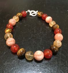 Success & Motivation Bracelet Energy Boost by NewMoonBeginnings Spiritual Round Amber Bracelet, Orange Agate Gemstone Bracelets, Amber Bracelets With Natural Stones, Elegant Orange Bracelet, Orange Carnelian Round Beaded Bracelets, Orange Round Carnelian Beaded Bracelets, Spiritual Orange Gemstone Bracelets, Orange Spiritual Gemstone Bracelets, Amber Round Beaded Bracelets With Natural Stones