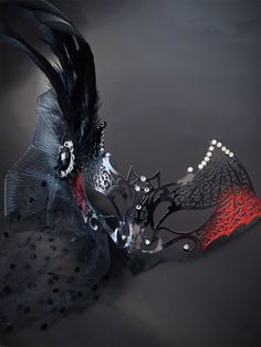 Our women's red and black metal bat masquerade mask, adorned with dazzling rhinestones and a dramatic black feather with tulle, is your key to a night of gothic enchantment and timeless allure. Whether you're attending a gothic masquerade ball, a vampire-themed event, or simply looking to make a dramatic and stylish entrance, this mask ensures you'll be the center of attention.


Age Group/Gender - Adult/Women

Size/Type - One size fits all adults

Mask Color - Red and black 

Mask Material - La Red And Black Masquerade Mask, Gothic Masquerade, Red Masquerade Mask, Rp Pic, Red Masquerade, Masquerade Ball Outfits, Vampire Mask, Masquerade Mask Women, Gothic Mask