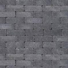 a gray brick wall with no mortars or mortars on the top and bottom