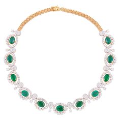 Cast from 14 karat gold, this stunning necklace is hand set with 28.25 carats Emerald and 19.90 carats of sparkling diamonds. FOLLOW MEGHNA JEWELS storefront to view the latest collection & exclusive pieces. Meghna Jewels is proudly rated as a Top Seller on 1stDibs with 5 star customer reviews. All items manufactured by us are handmade and can be customized or redesigned. Certificate of authenticity available upon request. Composition Total Weight :- 60.25 gm 14k Yellow Gold Weight :- 50.62 gm D Diamond Charm Necklace, Diamond Choker Necklace, Gemstone Choker, Diamond Choker, Zambian Emerald, Gold Diamond Necklace, Fitness Apparel, Emerald Necklace, Diamond Charm