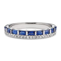 a white gold ring with blue sapphire and diamonds