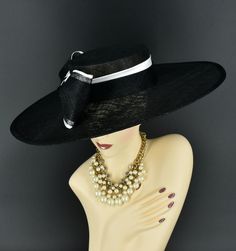 Note: The design of this hat, particularly the shallower crown, was crafted to create a unique aesthetic that suits some individuals perfectly. However, if you notice that the hat tends to slip, I would advise attaching an elastic strap to ensure a more secure and comfortable fit. ✿*.Key Features.*✿ This is a wide flat brim hat!! It's made of sinamay (3 layers ) and satin.  A nice sinamay bow is trimmed with satin ribbon too, very cool, one of my favorite hats! High quality. It's more beautiful in person! Great for Kentucky derby, weddings, church, Easter, Royal Ascot, horse races, cocktails, tea party, or any hat wearing occasion. Hat base size: From front to back: 19" (48cm) From left to right: 18.25" (46cm) Wide brim appr: 6" (15cm) Crown Depth: 3.5" (9cm) Hat girth: 21" (53.34cm). It f Luxury Formal Hats With Structured Crown, Luxury Formal Hat With Structured Crown, High Crown Headpiece For Royal Ascot Evening, Elegant Black High Crown Costume Hat, Evening High Crown Headpiece For Royal Ascot, Elegant Black High Crown Mini Hat, Classic Evening Hat With Structured Crown, Evening Top Hat For Royal Ascot With Structured Crown, Elegant Black Hat For Events