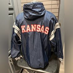 Kansas Jayhawks Champion Jacket Windbreaker Hoodie Xl Vintage Nwt. Shell 100% Nylon Body: 65% Polyester 35% Cotton Kansas University, Half Zip Windbreaker, Champion Jacket, Champion Brand, Black Windbreaker, Color Block Jacket, Kansas Jayhawks, Jacket Hoodie, Pullover Windbreaker