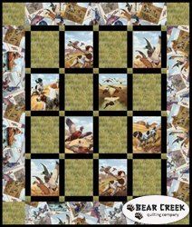 a quilt with many pictures of birds flying in the sky and on it's sides