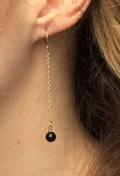 Black onyx earrings. These beautiful black onyx earrings feature a single black onyx bead wire wrapped onto a delicate gold filled chain attached to gold filled ear wire. The length of chain and bead is 2 inches. Delicate and feminine! Your earrings will arrive in a gift box. If this is a gift, I would be happy to include a card with your personal message - just let me know in the message section at checkout. Black Onyx Jewelry, Bead Wire, Earrings Minimal, Black Onyx Earrings, Black Earrings Dangle, Minimal Earrings, Jewelry Dainty, Onyx Jewelry, Jewelry Black