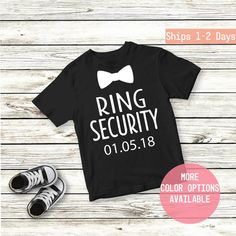 ring security shirt with bow tie on it