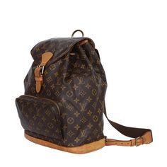 Authentic Louis Vuitton Montsouris GM backpack. The backpack is designed with LV's traditional monogrammed coated canvas with treated leather trim and gold tone hardware. The interior features a brown canvas lining with one pocket. There is a buckle closure, an extra-large interior with a slit pocket, a D ring, and straps that are adjustable. This unisex bag is perfect for everyday use. Authenticity date code: MI0969 Montsouris Backpack, Louis Vuitton Gm, Pre Owned Louis Vuitton, Quality Handbags, Waist Bags, Bag Packaging, Brown Canvas, D Ring, Leather Trim