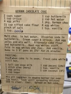 a piece of paper that has some type of chocolate cake on it with instructions for the recipe