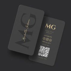 a black and gold business card with the letter mg on it's side