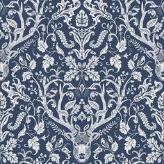 a blue and white wallpaper with deer heads