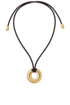 14k gold-plated brass pendant on corded necklace.  Made in China.  Adjustable sliding bead.  Can be worn multiple ways: as a choker or long necklace.  .  .  .  .  .  .  .  .  .  .  .  . Corded Necklace, Brass Pendant, Made In China, Metallic Gold, Long Necklace, Womens Jewelry Necklace, Gold Metal, Choker, Jewelry Necklaces