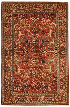 an antique persian rug with red and blue colors