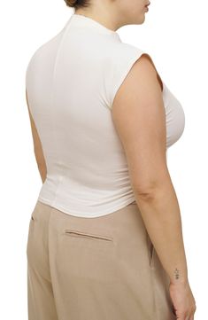 Stretch-hinted organic cotton offers exceptional comfort in this ruched crop top with an elegant mock neckline. 19" length (size Medium) Mock neck Sleeveless 88% organic cotton, 12% spandex Machine wash, tumble dry Imported Fitted Cropped Beige Tank Top, Versatile Fitted Beige Tank Top, Sleeveless Stretch Tops With Ruched Back, Sleeveless Top With Ruched Back, Elegant Sleeveless Top With Ruched Back, Versatile Fitted Top With Ruched Back, Fitted Casual Top With Ruched Back, Fitted Ruched Crop Top, Sleeveless Elastane Top With Ruched Back