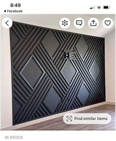 the wall is decorated with black and white geometric designs