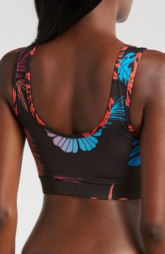 Take a swim or lounge around poolside in this sleek swim top designed with built-in UPF protection and quick-drying fabric. UPF 50+ sun protection   Lined   80% recycled polyester; 20% spandex   Hand wash, line dry   Imported Multicolor Tropical Swimwear For Sports, Multicolor Summer Workout Swimwear, Summer Multicolor Workout Swimwear, Multicolor Workout Swimwear, Nylon Athleisure Sports Bra, Medium Support Nylon Athleisure Swimwear, Moisture-wicking Elastane Swimwear For Workout, Athleisure Elastane Swimwear, Bra Friendly, Sporty Tankini With Uv Protection For Poolside