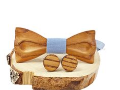 "E.Lash - Lithuanian designer specializing in handmade bow ties, pocket squares, cufflinks, earrings and other accessories since 2013. Brown wooden bow tie and cufflinks are designed by E.Lash and made with love: * Bow tie material: natural wood * Cufflinks material: natural wood * Pocket square - same fabric as middle of bow tie (Linen); * Suspenders - same fabric as middle of bow tie (Linen); * Handmade; * Accessories are packaged in stylish gift box; * Pocket square from over 500+ various col Cufflinks For Father's Day Gift, Classic Bow Tie For Suit Accessories As Gift, Father's Day Jewelry Gift With Ties, Adjustable Suit And Tie Accessories For Father's Day Gift, Adjustable Bow Tie For Gifts, Adjustable Bow Tie For Suit As Gift, Brown Bow Tie For Father's Day Gift, Father's Day Gift Bow Tie And Suit Accessories, Father's Day Bow Tie Gifts