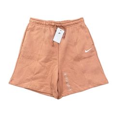 Nike Women's Sportswear Essential Fleece High Rise Shorts Sporty Spring Fleece Bottoms, Athleisure Sweatpants For Streetwear, Athleisure Short Sweatpants For Streetwear, Sporty Fleece Workout Bottoms, Sporty Fleece Bottoms For Workout, Cotton Sports Shorts, Casual Short Sweatpants For Sports, Sports Fleece Bottoms With Drawstring, Sporty Short Sweatpants For Loungewear