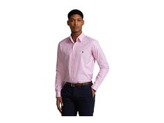 Polo Ralph Lauren Classic Fit Stretch Oxford Shirt - Men's Clothing : Pink : Make your first impression in the classic Polo Ralph Lauren Classic Fit Stretch Oxford Shirt. A standard-fit shirt in a comfortable, relaxed silhouette. Button-down spread collar. Long sleeves with buttoned barrel cuffs. Full button-front closure. A chic embroidered pony player at left chest. Center box pleat at straight back yoke. Shirttail hemline. 97% cotton, 3% elastane. Machine wash. Imported. Casual Pink Button-up Dress Shirt, Spring Collared Dress Shirt, Classic Polo Collar Shirt For Work, Professional Collared Shirt With Button Closure, Casual Fitted Dress Shirt With Lapel Collar, Fitted Casual Dress Shirt With Lapel Collar, Casual Pink Dress Shirt For Spring, Pink Collared Casual Dress Shirt, Casual Pink Collared Dress Shirt