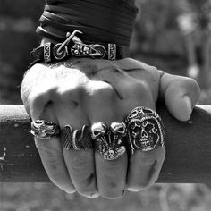 Introducing the Skull Engine Ring, a bold and edgy piece that is sure to make a statement. Crafted from high-quality stainless steel, this ring features intricate details of a skull wearing a motorcycle helmet with a piston engine on the sides. The Skull Engine Ring is perfect for bikers and anyone who loves the thrill of the ride. This ring is not just a piece of jewelry, it's a symbol of freedom and adventure. Made from durable and rust-resistant stainless steel, the Skull Engine Ring is built Biker Style Stainless Steel Jewelry For Biker Events, Vintage Black Skull Ring, Punk Metal Skull Ring For Streetwear, Black Punk Skull Ring For Biker Events, Black Skull Ring For Biker Events, Biker Style Skull Jewelry, Punk Skull Ring For Biker Events, Silver Biker Skull Ring For Biker Events, Biker Skull Ring For Biker Events