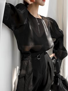 A long sleeve blouse with extra wide cuff, padded shoulders and balloon sleeves for added volume. Shiny, sheer fabric for sensual classy look. Pair with work pants, luxe skirt or denim to change the look. Model is in MINUSEY ONE SIZE. ✔️ Free worldwide express shipping over $100✔️ Loved by 6,500+ customers✔️ Limited edition collections, maximum style⠀⠀⠀⠀⠀⠀⠀⠀⠀Stay ahead of the trend with can’t-find-anywhere-else staples. Your closet will thank you 💕 * MINUSEY ONE SIZE = EU 34-38, US 2-6* 100% Polyester* Dry clean* Made in Korea - Model Height: 170cm/5'7" (US2, EU34) Wide Cuff, Sheer Fabric, High Fashion Street Style, How To Look Classy, The Trend, Balloon Sleeves, Sheer Fabrics, Work Pants, Street Fashion