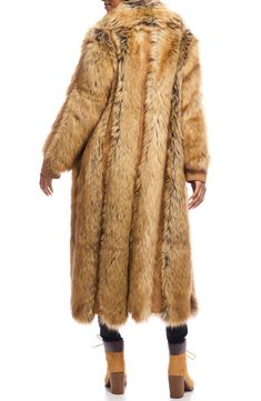 Columns of luxuriously soft faux fur texture this glamorous faux-suede coat that's perfect for cool nights on the town. 47" length Front snap closure Spread collar On-seam pockets Lined 63% acrylic, 25% modacrylic, 12% polyester faux fur with 100% polyester contrast Machine wash, line dry Imported Luxury Fall Fur Coat With Faux Fur Trim, Luxury Fur Coat With Faux Fur Trim For Fall, Luxury Outerwear With Faux Fur Trim, Luxury Faux Fur Outerwear With Fur Trim, Luxury Fluffy Outerwear For Fall, Fall Mink Color Fur Coat With Faux Fur Trim, Fall Faux Fur Coat With Faux Fur Trim, Long Fur Coat With Faux Fur Lining For Fall, Faux Fur Lined Long Coat For Fall