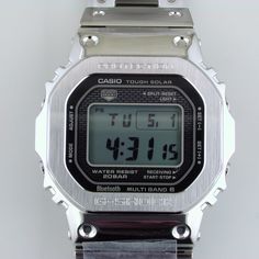 Limit of One Watch per Customer. Ships to USA Only. Available for order. Allow approximately 3 weeks for delivery.GMW-B5000 / Released to celebrate the 35th anniversary of this iconic design.A SQUARE CASE WITH A FULL-METAL SHOCK-RESISTANT STRUCTURE.ACHIEVED THROUGH SYSTEMATIC EVOLUTION FROM ONE STAGE TO THE NEXT.The first G-SHOCK model DW-5000C was born in 1983. Its symbolic square design is reinvented with a full-metal shock-resistant structure and the latest advanced functions, including Smart Business Chronograph Watch In Silver With 10atm Water Resistance, Silver Classic Digital Watch With Date Display, Classic Silver Digital Watch With Date Display, Classic Digital Watch With Rectangular Dial And Date Display, Silver Automatic Digital Watch, Silver Digital Watch With 10atm Water Resistance, Classic Silver Digital Watch With Subdials, Advanced Functions, Born In 1983