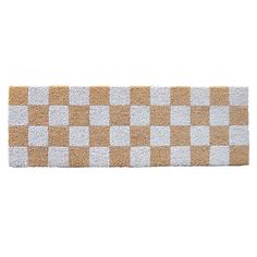 a brown and white checkered door mat